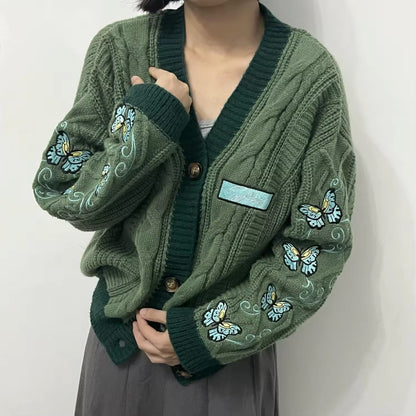 green taylor swift inspired cardigan with butterfly embroidery.